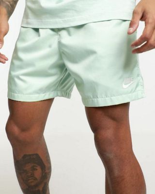 nike club shorts in dusty green